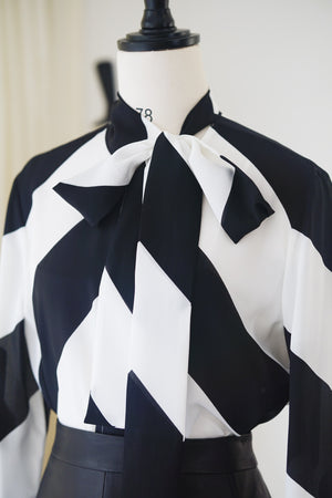 Spring/Summer 24 Black and white silk bow tie blouse