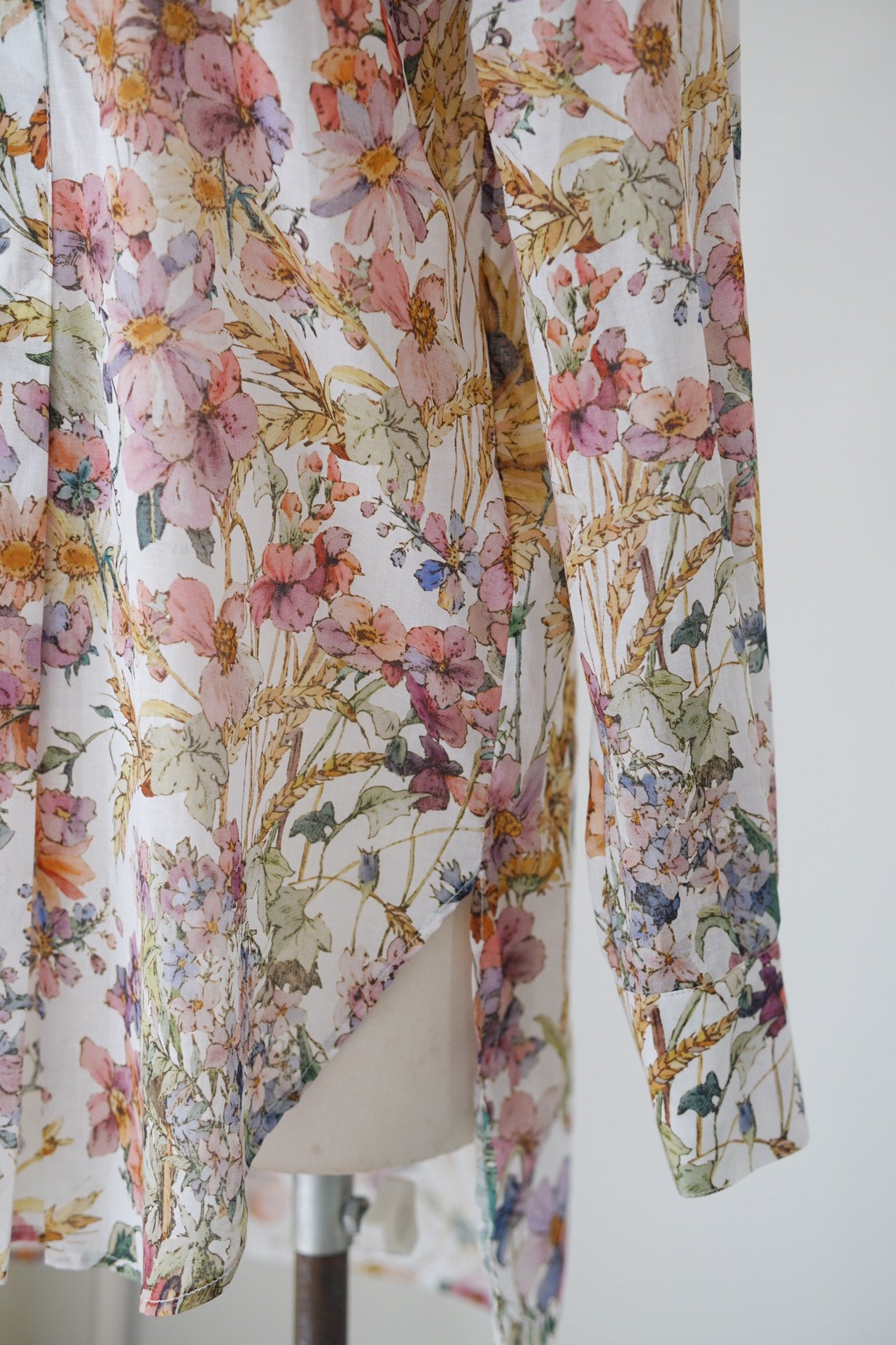 Spring/Summer 24 Bee embroidered floral silk blouse.