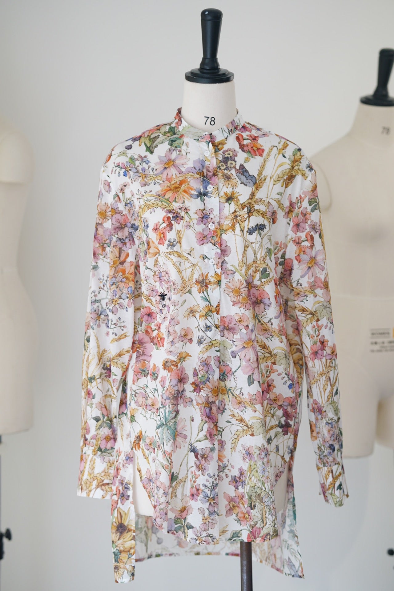 Spring/Summer 24 Bee embroidered floral silk blouse.